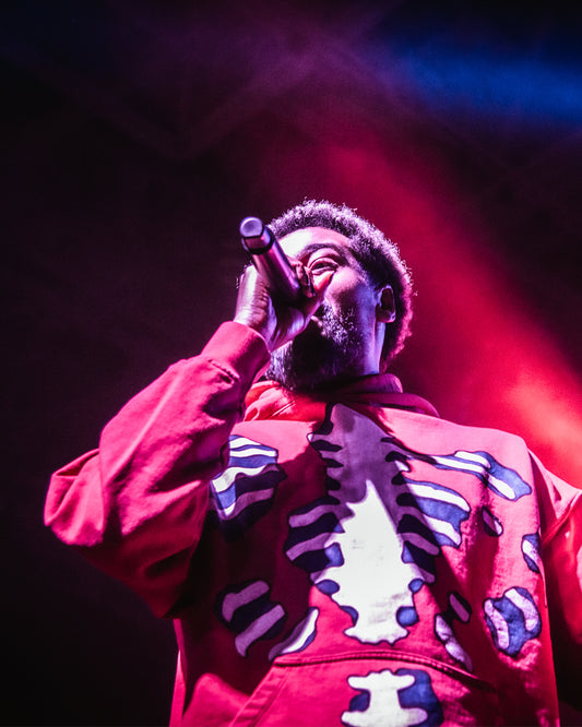 Danny Brown performs while wearing Mykes Lab